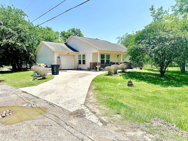 ranch-style house with a front yard and a garage