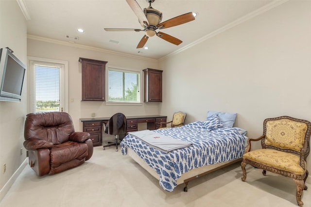 bedroom featuring crown molding, light carpet, and ceiling fan