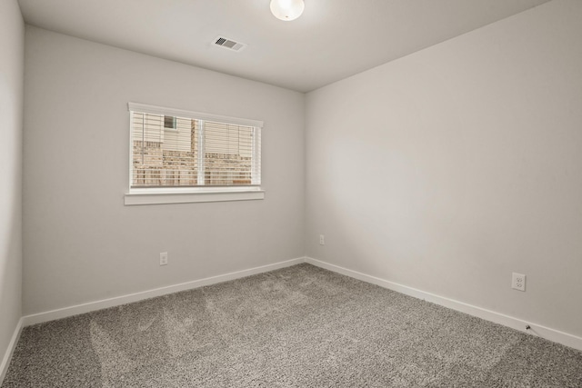 spare room with carpet floors