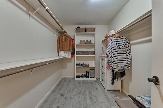 walk in closet featuring light wood-type flooring