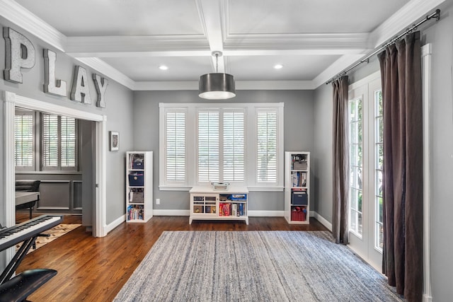 playroom with beamed ceiling, ornamental molding, and coffered ceiling