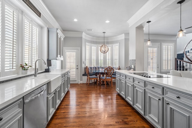 kitchen featuring black electric cooktop, stainless steel dishwasher, hanging light fixtures, and gray cabinetry