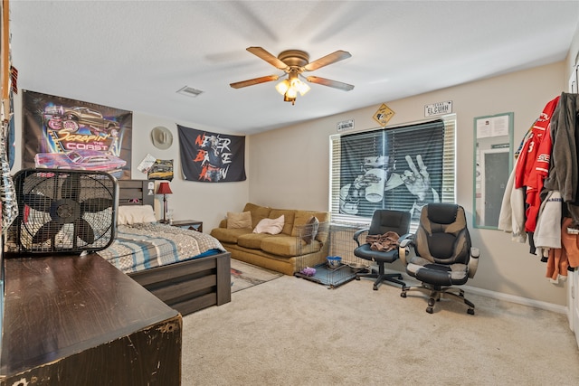 interior space with ceiling fan