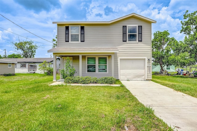 view of front of home featuring a front yard and a garage