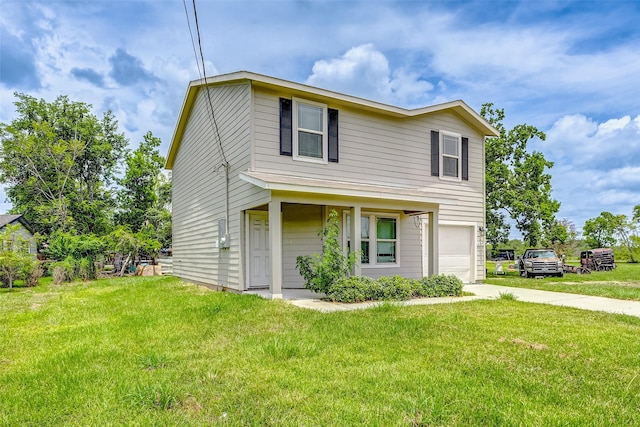 view of front of home with a front yard and a garage