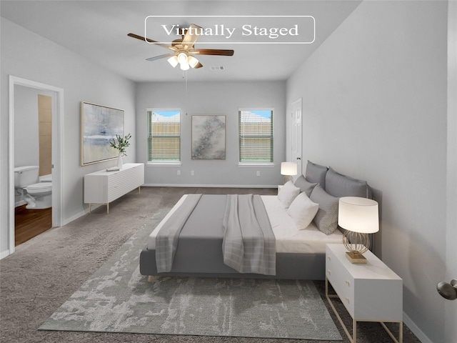 carpeted bedroom featuring ensuite bathroom and ceiling fan