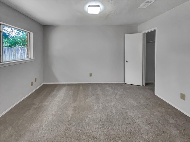 unfurnished room featuring carpet floors