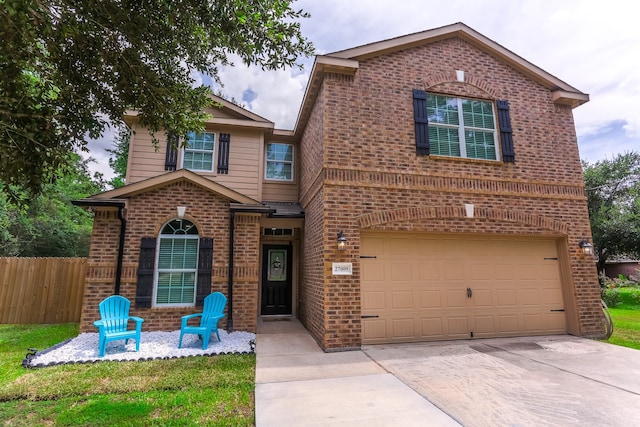 front facade with a garage