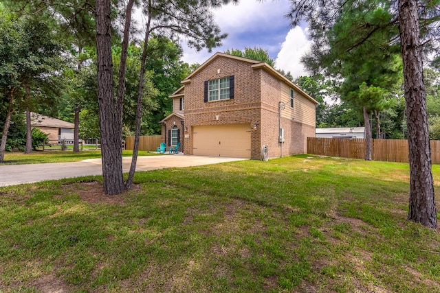 exterior space featuring a garage and a front lawn