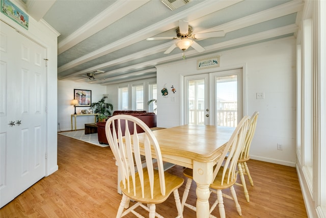 dining room featuring crown molding, french doors, light wood-type flooring, and ceiling fan