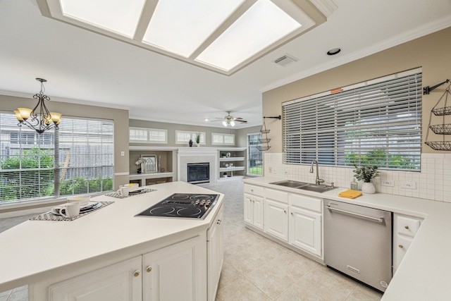 4210 Olive Oak Ct, Houston, TX 77059 - kitchen featuring stainless steel dishwasher, a sink, crown molding, light countertops, and white cabinetry