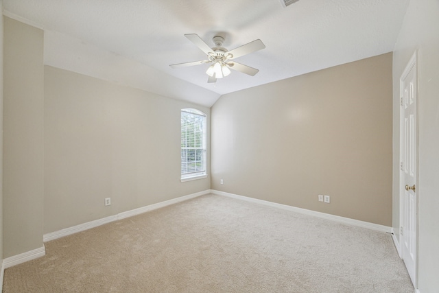 4210 Olive Oak Ct, Houston, TX 77059 - unfurnished room featuring light carpet, baseboards, ceiling fan, and vaulted ceiling