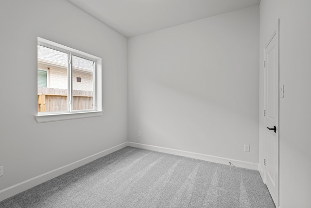 unfurnished room featuring carpet floors