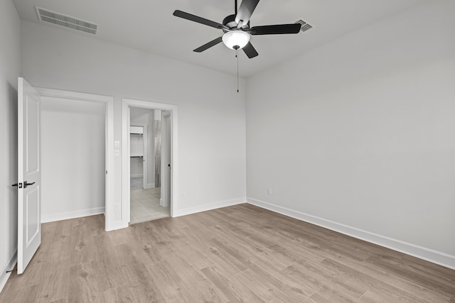 unfurnished bedroom featuring ceiling fan and light hardwood / wood-style flooring