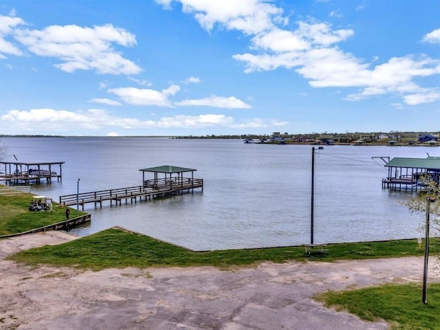 dock area with a water view