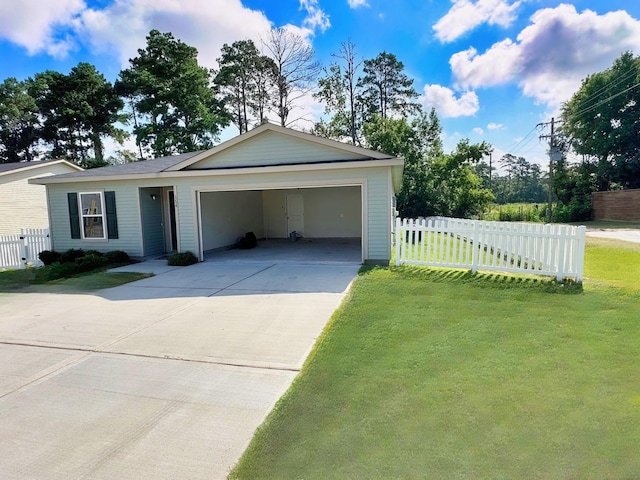 view of front of home featuring a garage and a front lawn