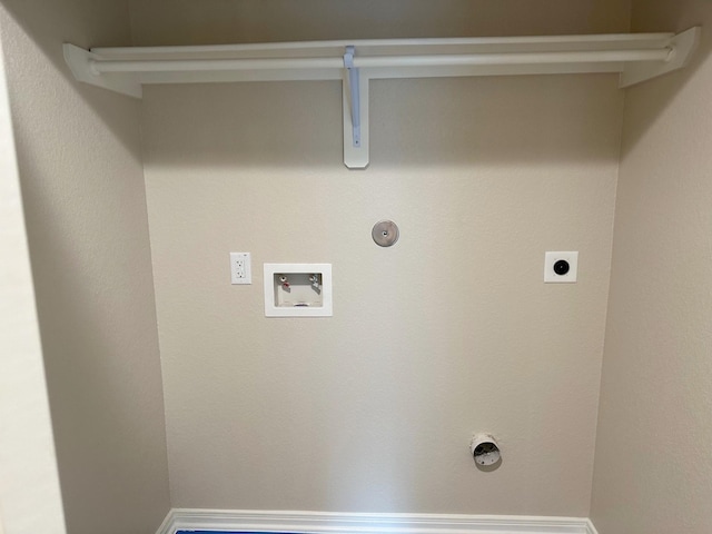 washroom with gas dryer hookup, electric dryer hookup, and washer hookup