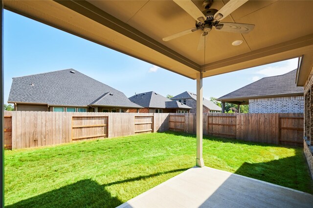 view of yard featuring ceiling fan