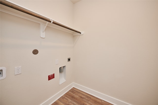 laundry area with hardwood / wood-style floors and electric dryer hookup