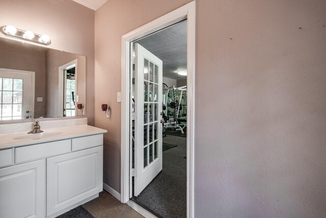 bathroom featuring vanity and tile patterned floors