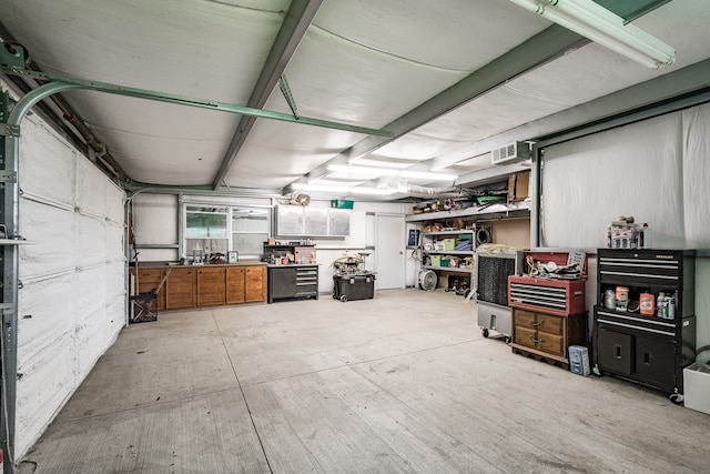 garage with a workshop area