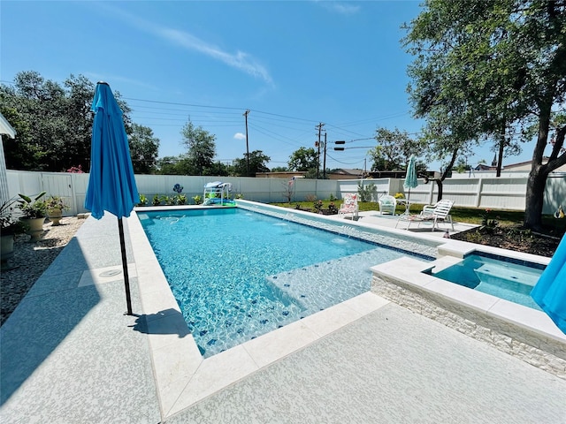 view of swimming pool featuring a patio