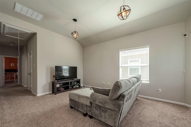 living room featuring carpet flooring and vaulted ceiling