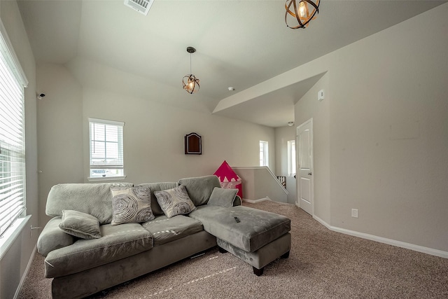 living room with carpet and a wealth of natural light