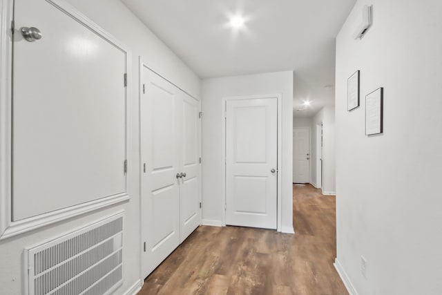 hall featuring dark hardwood / wood-style floors