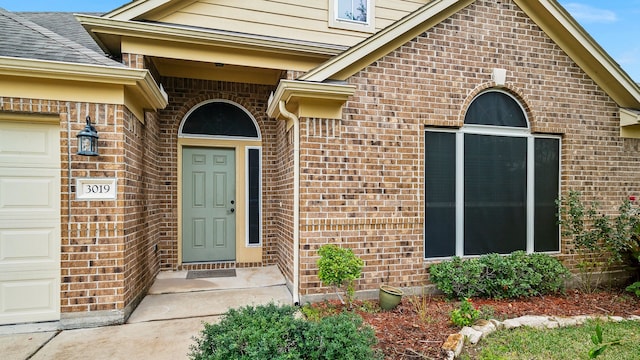 property entrance featuring a garage