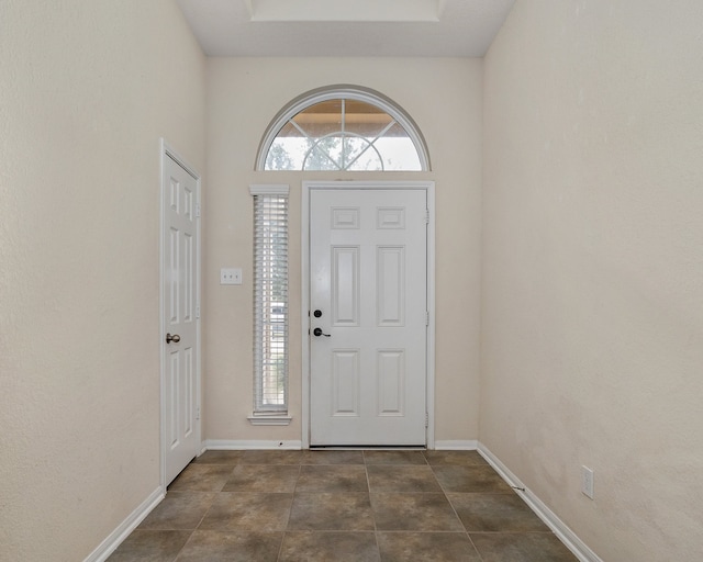 entryway with tile patterned floors