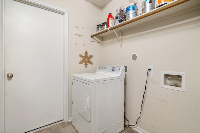 3019 Fern Brook Ln, Rosenberg, TX 77471 - laundry area with washer / dryer, light tile patterned floors, and baseboards