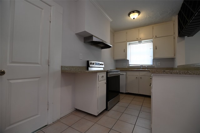 kitchen featuring wall chimney range hood, sink, electric stove, and light tile patterned floors