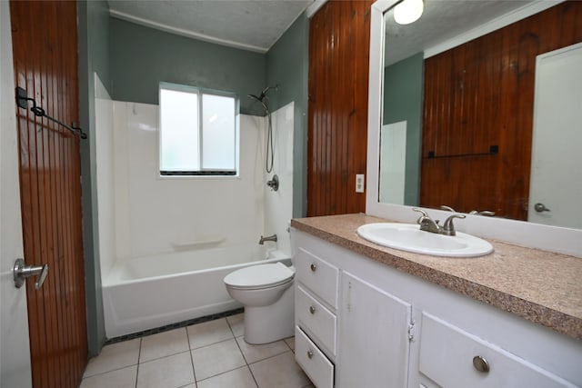 full bathroom with tile patterned flooring, bathtub / shower combination, toilet, and vanity