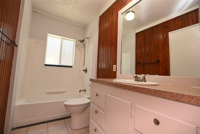 full bathroom with tile patterned flooring, a textured ceiling, toilet, shower / bathtub combination, and vanity