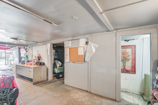 interior space featuring a textured ceiling