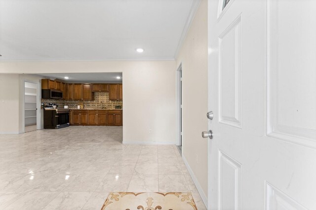 living room with ornamental molding