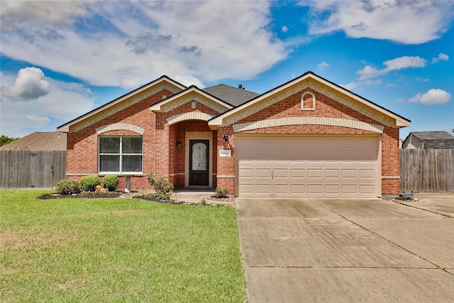 single story home with a garage and a front lawn