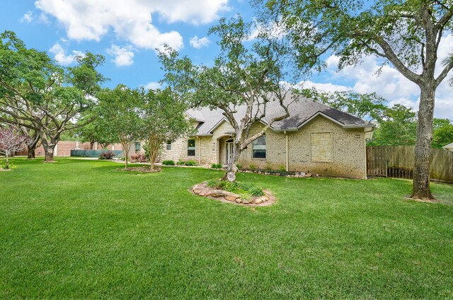 view of front of home with a front yard