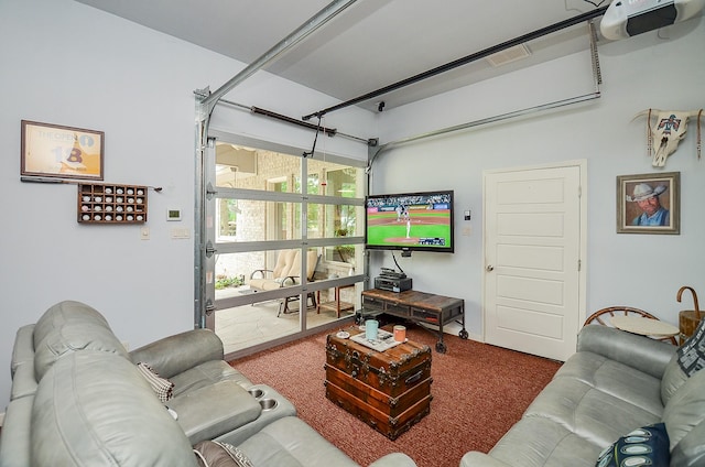 carpeted living room with a garage