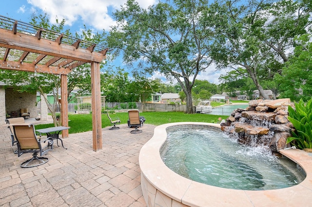 view of pool with a patio area, a fenced backyard, a pergola, and a yard