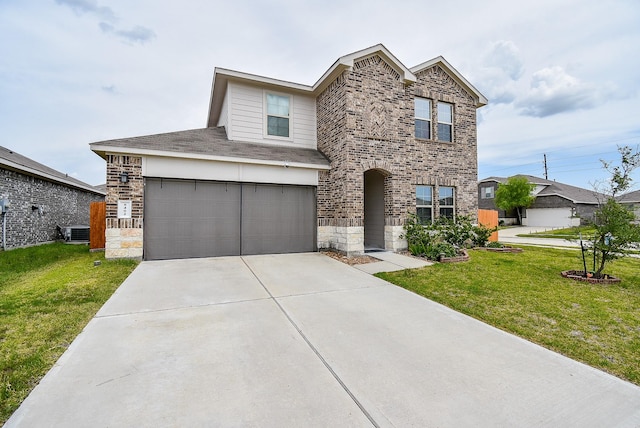 view of front of home featuring a front yard, a garage, and central AC unit