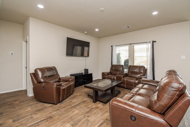 living room with wood-type flooring