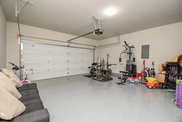 garage with electric panel and a garage door opener