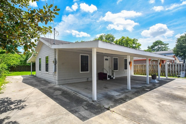 view of front of house featuring a carport