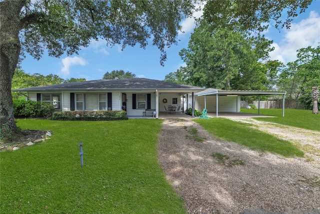 ranch-style house featuring a porch and a front lawn