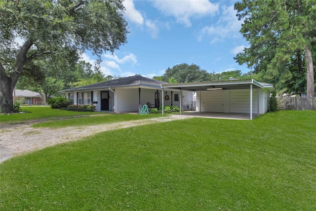 single story home with a carport and a front yard