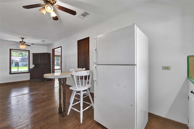 kitchen featuring white refrigerator, hardwood / wood-style flooring, and ceiling fan