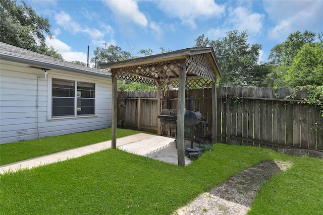 view of yard featuring a patio and a gazebo