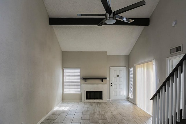 unfurnished living room featuring light tile patterned floors, a textured ceiling, lofted ceiling with beams, and ceiling fan